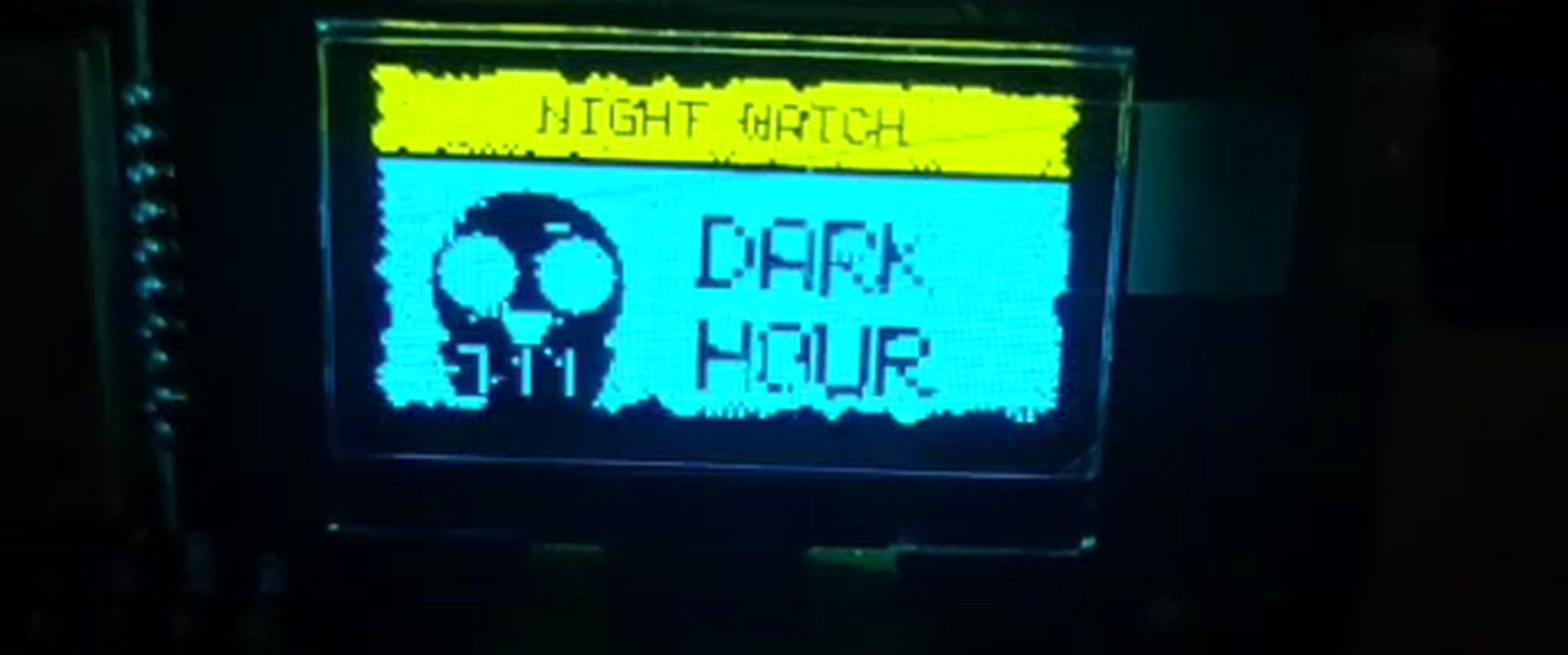 LatentField OLED showing NIGHT WATCH / DARK HOUR — wide panoramic crop